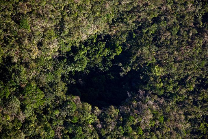 Black Hole Drop Belize tour,is Black Hole Drop Belize worth it,Black Hole Drop vs ATM Cave,Black Hole Drop Belize best time,Black Hole Drop Belize tour deals,best adventure tours in Belize - best seasons and travel conditions