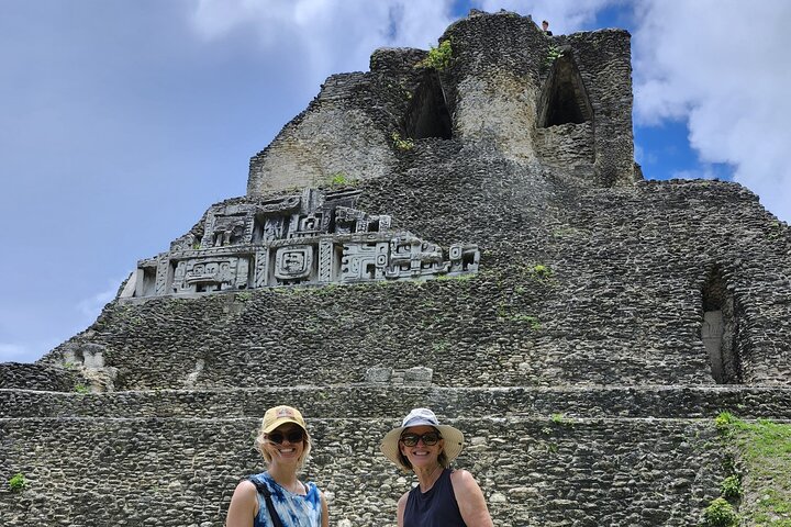 Step-by-step travel guide for Xunantunich and cave tubing tour,Xunantunich tour from Placencia,Jaguar Paw cave tubing Belize,best tours in Placencia Belize,is Xunantunich worth visiting,Belize adventure tours - transport and logistics
