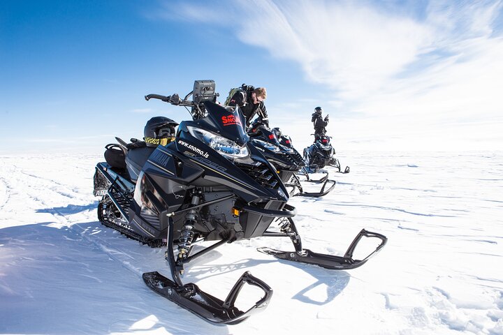 Step-by-step travel guide for snowmobile tour in Iceland,is snowmobiling in Iceland worth it,Iceland glacier snowmobile tours,best snowmobile tours Iceland,Langjökull glacier snowmobiling,Iceland snowmobile tour deals - transport and logistics