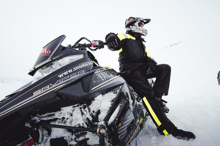 snowmobile tour in Iceland,is snowmobiling in Iceland worth it,Iceland glacier snowmobile tours,best snowmobile tours Iceland,Langjökull glacier snowmobiling,Iceland snowmobile tour deals - best seasons and travel conditions
